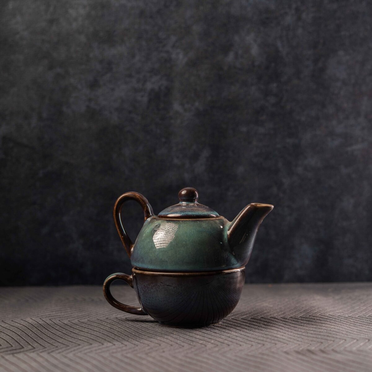 ceramic tea pot with cup