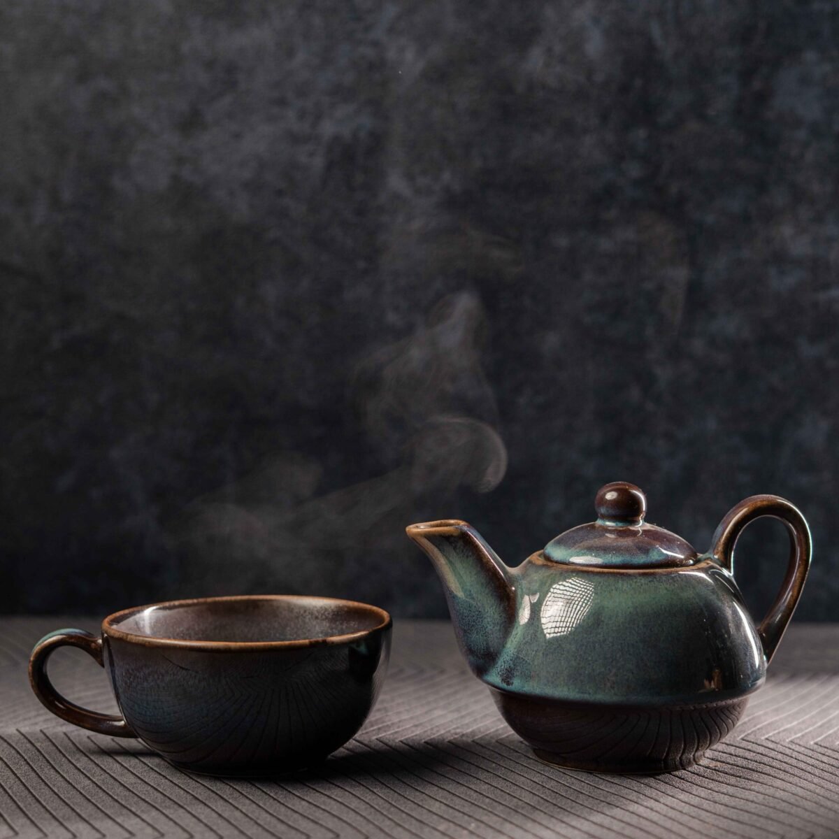 ceramic tea pot with cup