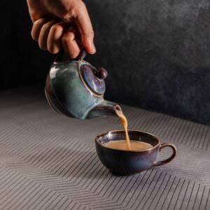 ceramic tea pot with cup