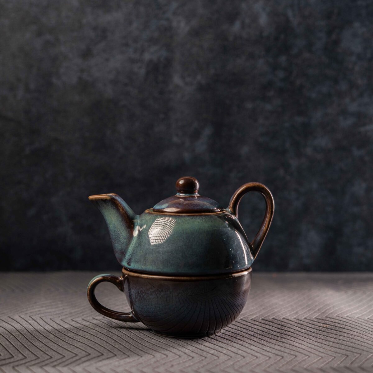 ceramic tea pot with cup