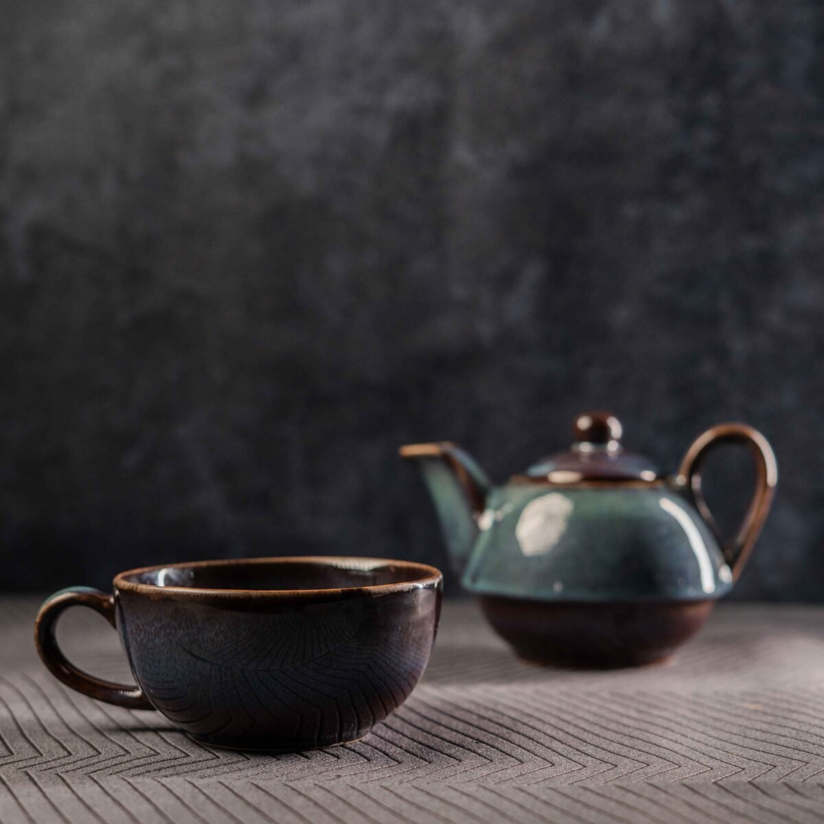 ceramic tea pot with cup