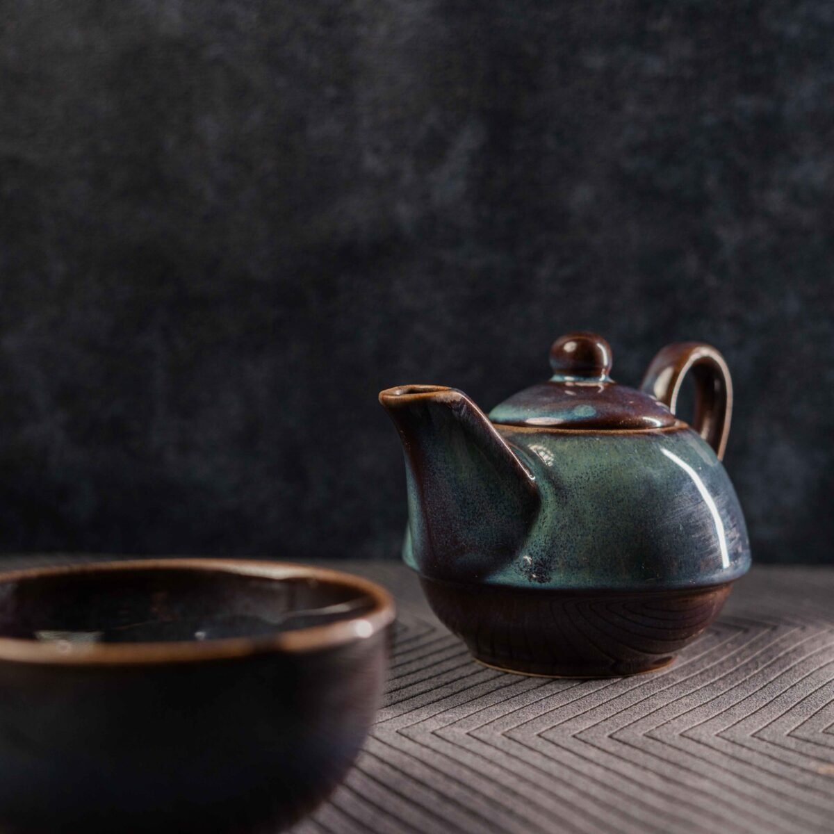 ceramic tea pot with cup
