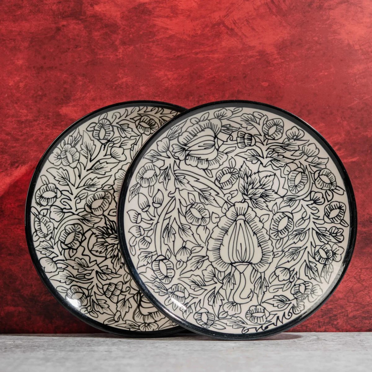Monarca Ceramic Dinner Plates – Set of 2 (10 inches) by Harmiche. Hand-painted black floral design, microwave & dishwasher safe. Perfect for dining.