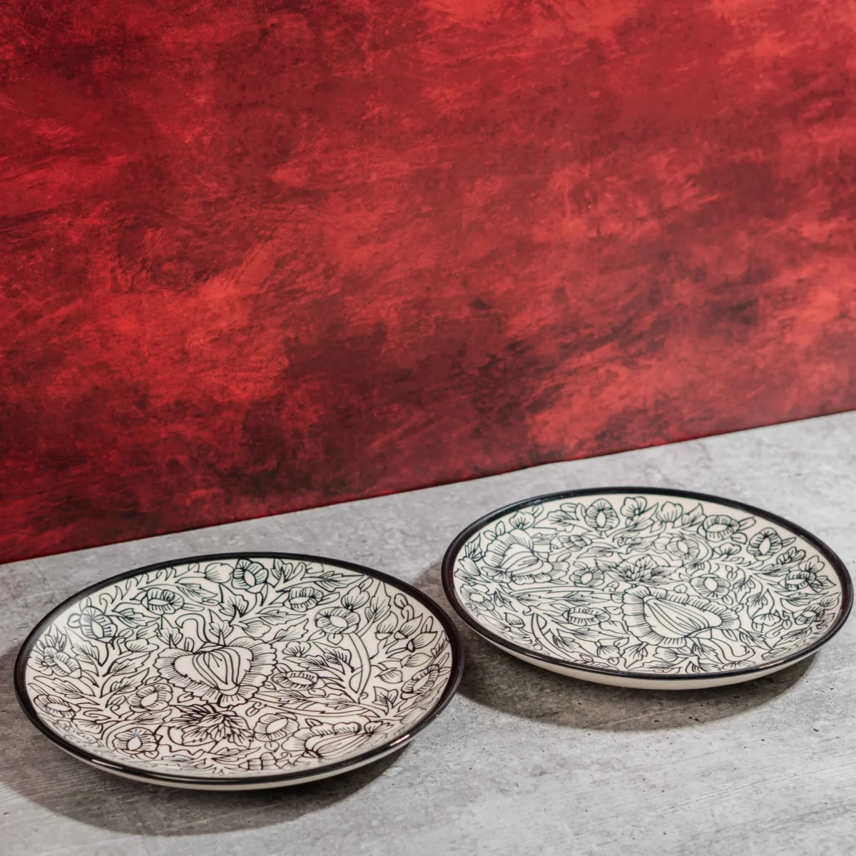 Monarca Ceramic Dinner Plates – Set of 2 (10 inches) by Harmiche. Hand-painted black floral design, microwave & dishwasher safe. Perfect for dining.