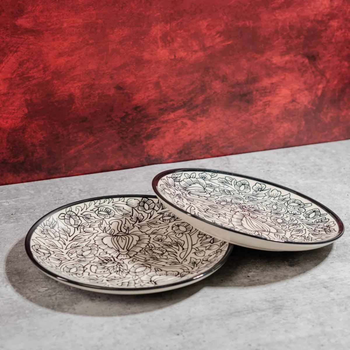 Monarca Ceramic Dinner Plates – Set of 2 (10 inches) by Harmiche. Hand-painted black floral design, microwave & dishwasher safe. Perfect for dining.