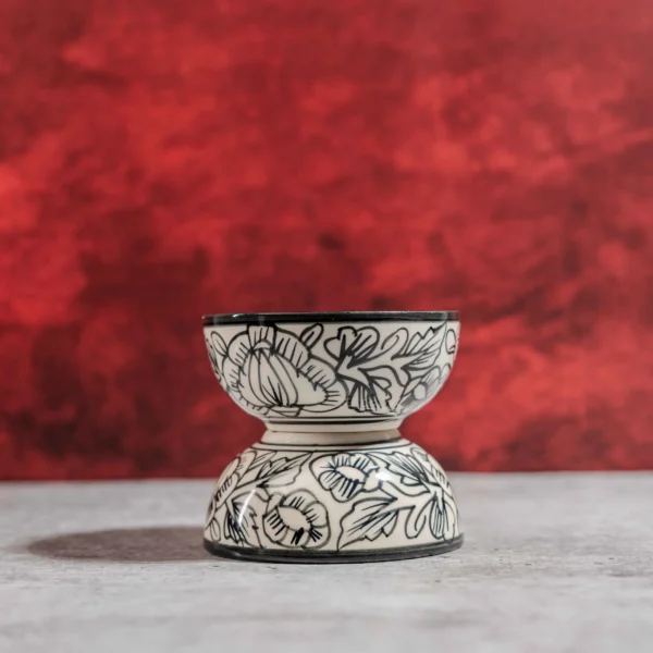 Monarca Ceramic Katori Bowls – Set of 2 by Harmiche. Hand-painted black floral design, microwave & dishwasher safe. Perfect for curries, dal & desserts.