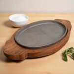 Oval Sizzler Plate Cast Iron with Rosewood Wooden Tray – 10x6 Inches by Harmiche