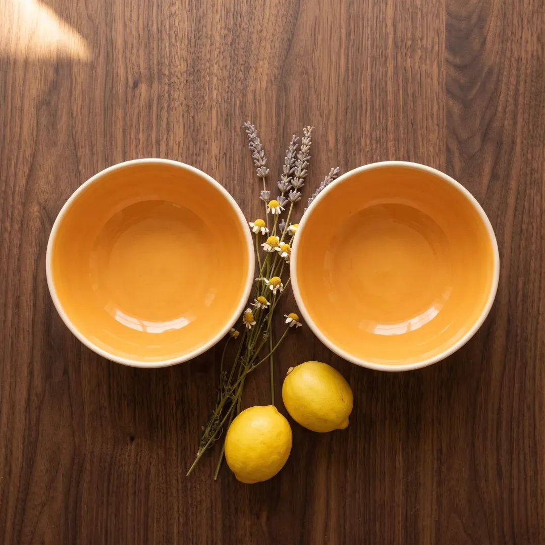 Harmiche Marigold Glow Ceramic Soup Bowls Set of 2 – 300ml, amber glaze, matte cream exterior, handcrafted. Food safe. Shop now.