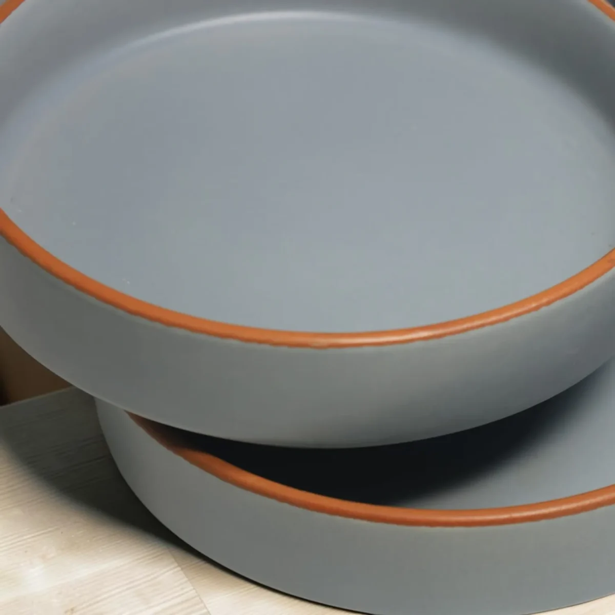 Harmiche Signature Grey Stoneware Salad Bowls, Set of 2 | 8 inch, matte slate glaze, exposed terracotta rim. Oven & dishwasher safe. Shop now.