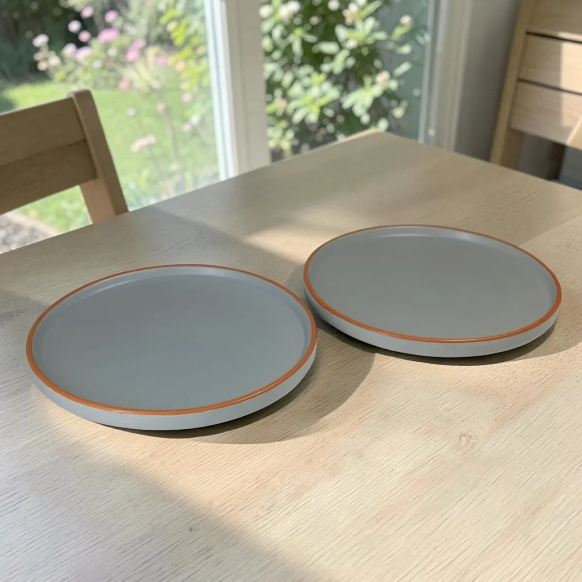 Harmiche Signature Grey Stoneware Dinner Plate, 10 inch | Matte slate, terracotta rim. Single, Set of 2, 4 & 6. Oven & dishwasher safe. Shop.