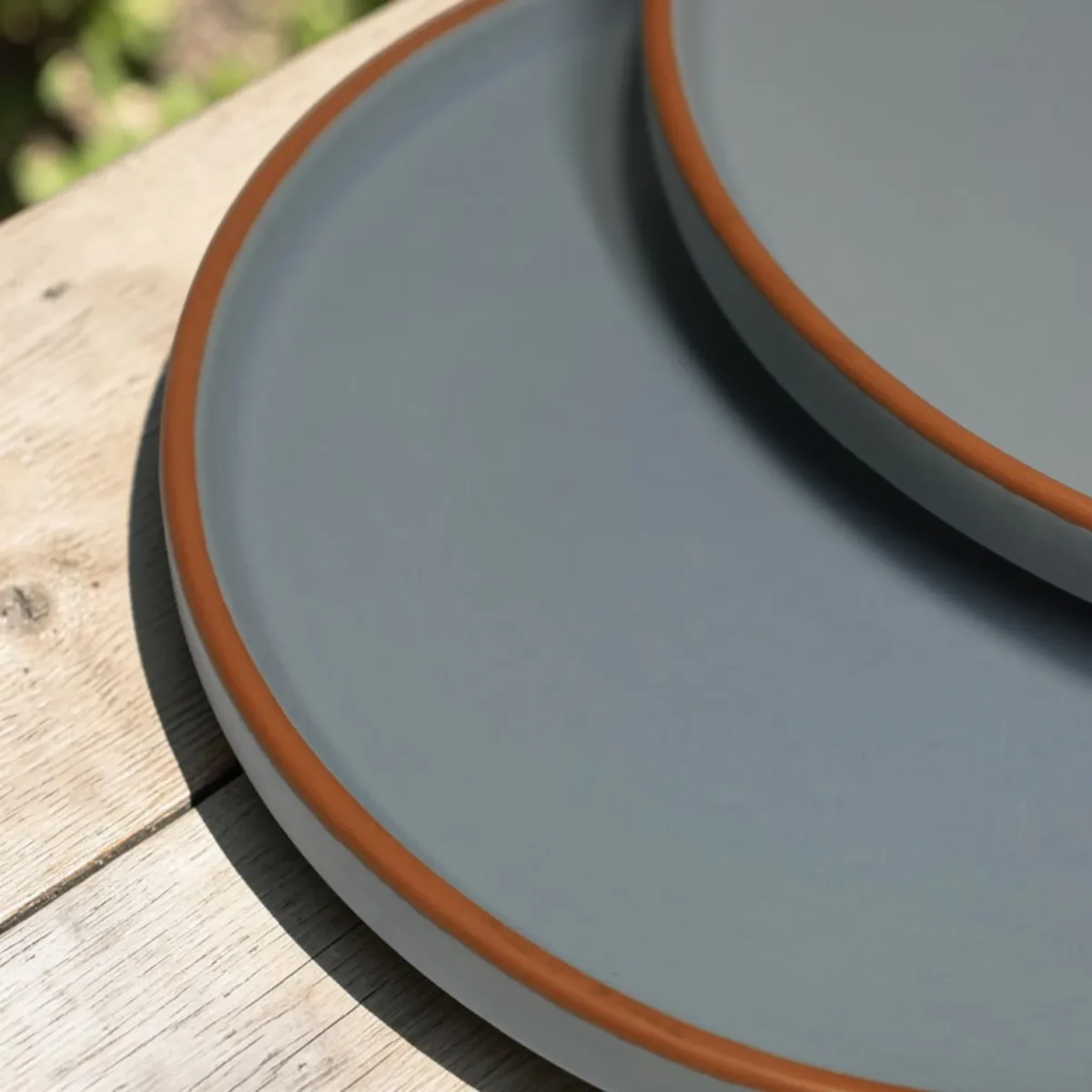 Harmiche Signature Grey Stoneware Dinner Plate, 10 inch | Matte slate, terracotta rim. Single, Set of 2, 4 & 6. Oven & dishwasher safe. Shop.