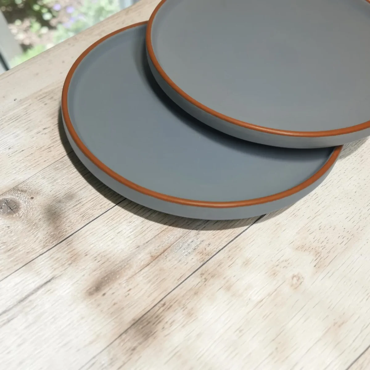 Harmiche Signature Grey Stoneware Dinner Plate, 10 inch | Matte slate, terracotta rim. Single, Set of 2, 4 & 6. Oven & dishwasher safe. Shop.